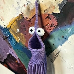 Wow! Martian crocheted plant hanger